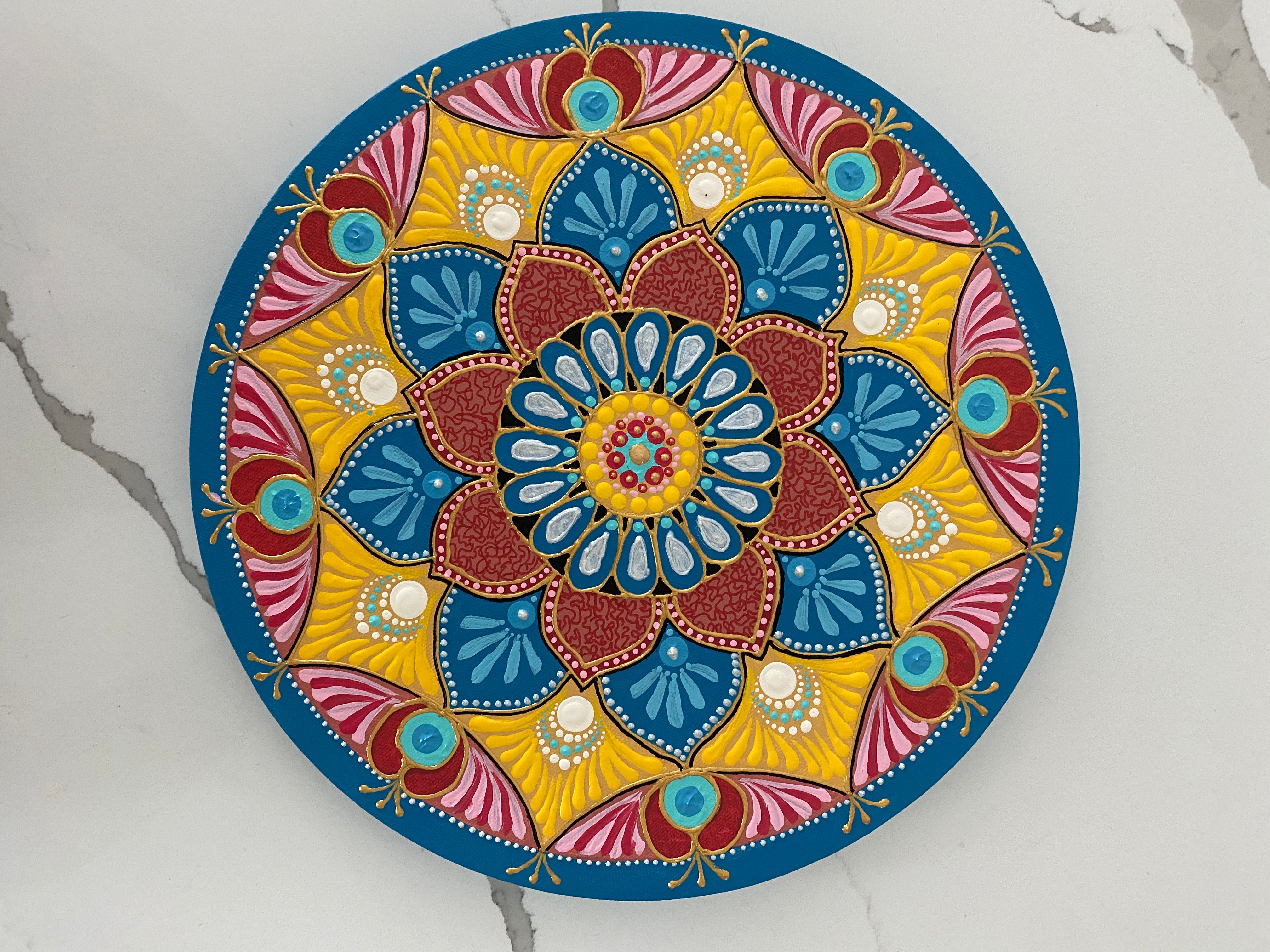 Beautiful Mandala created in colors and design reminding one of festive joy!